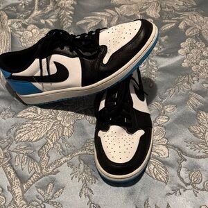 Nike Black and White Athletic Shoes with Blue Accents